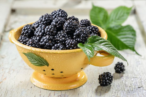 A colander of blackberries. Getty Images
